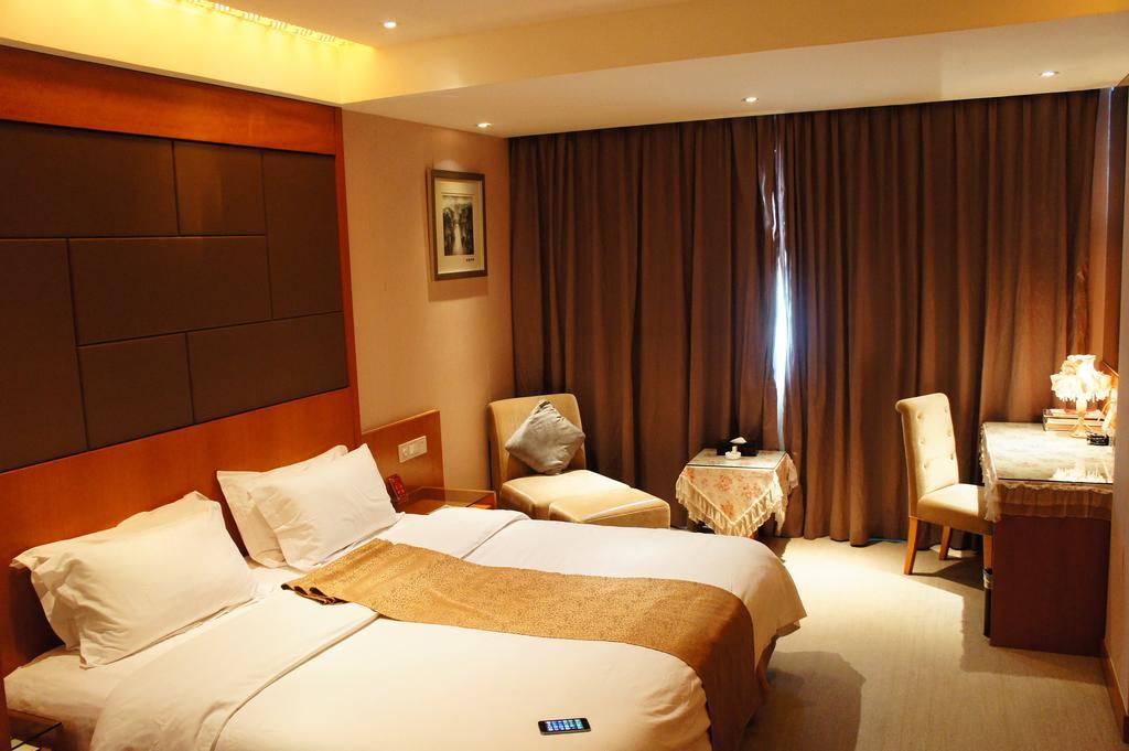 Oriental Hotel Tong Xiang Jiaxing Rom bilde