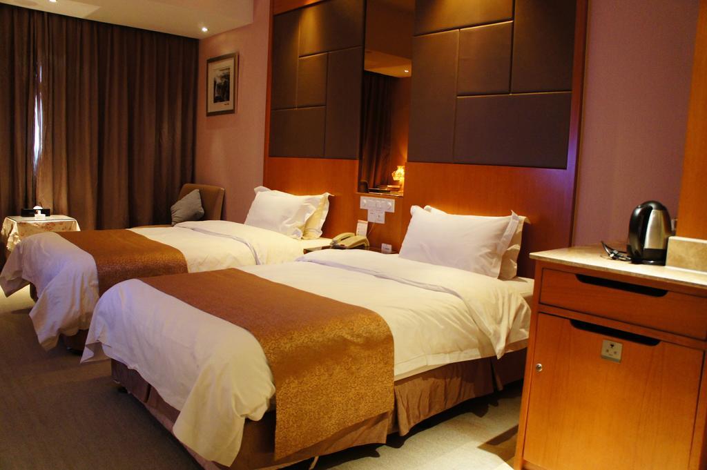 Oriental Hotel Tong Xiang Jiaxing Rom bilde