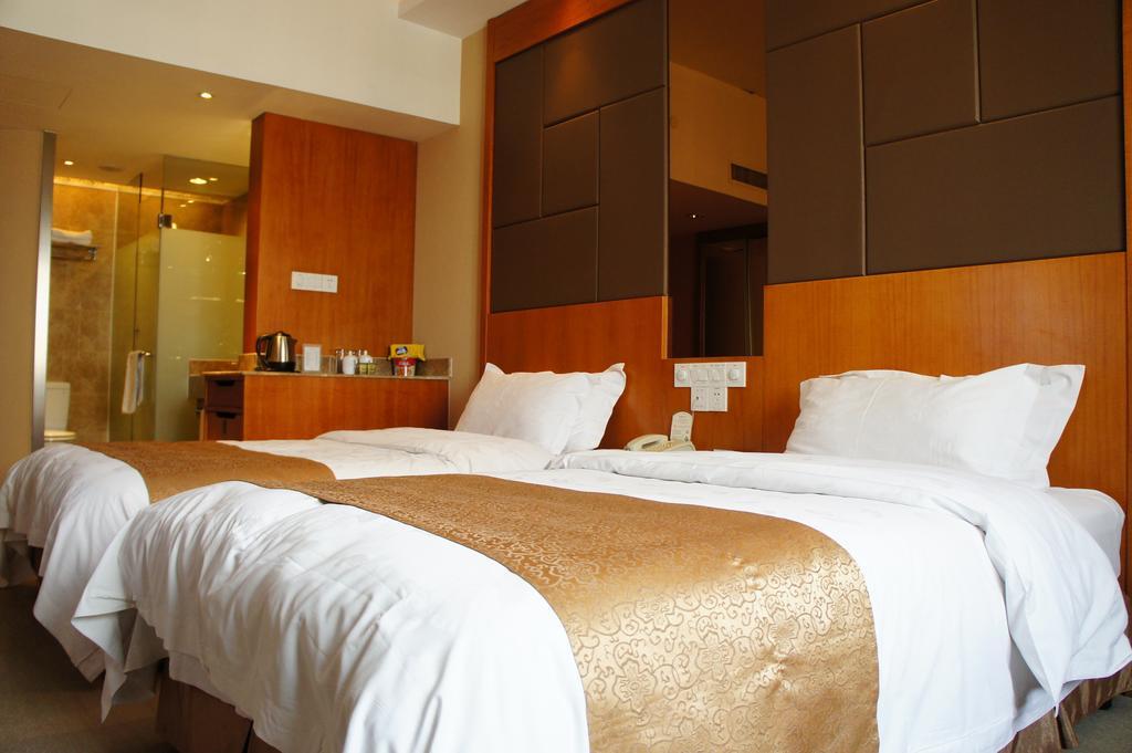 Oriental Hotel Tong Xiang Jiaxing Rom bilde