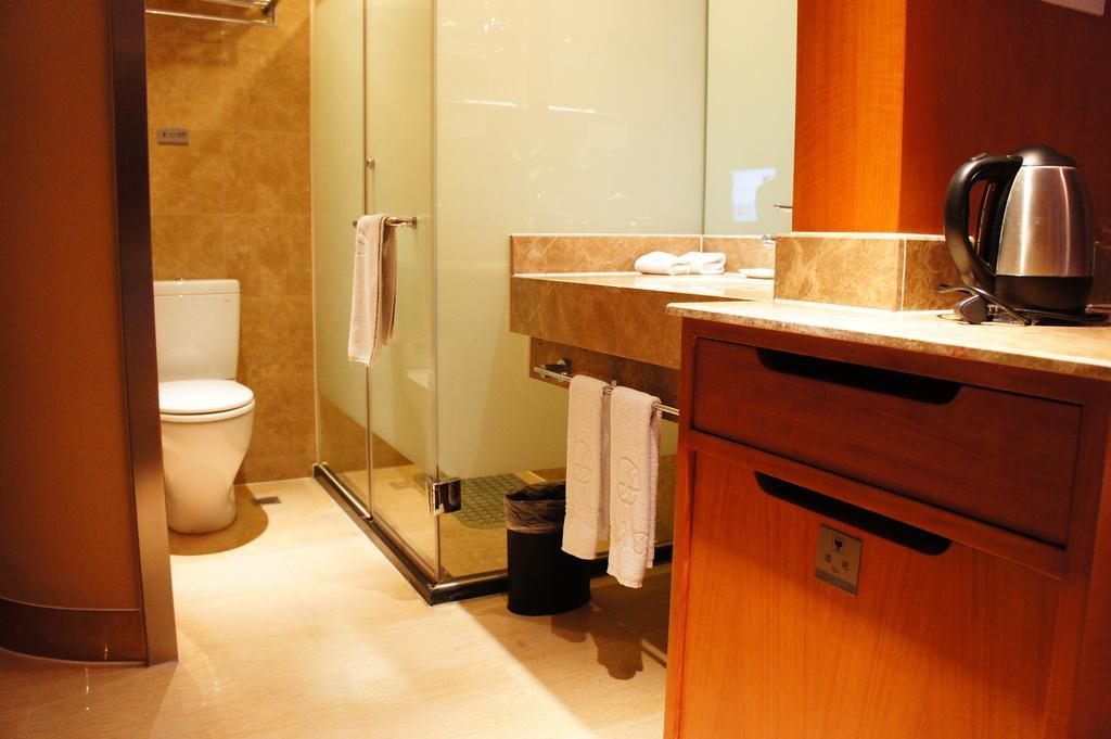 Oriental Hotel Tong Xiang Jiaxing Rom bilde