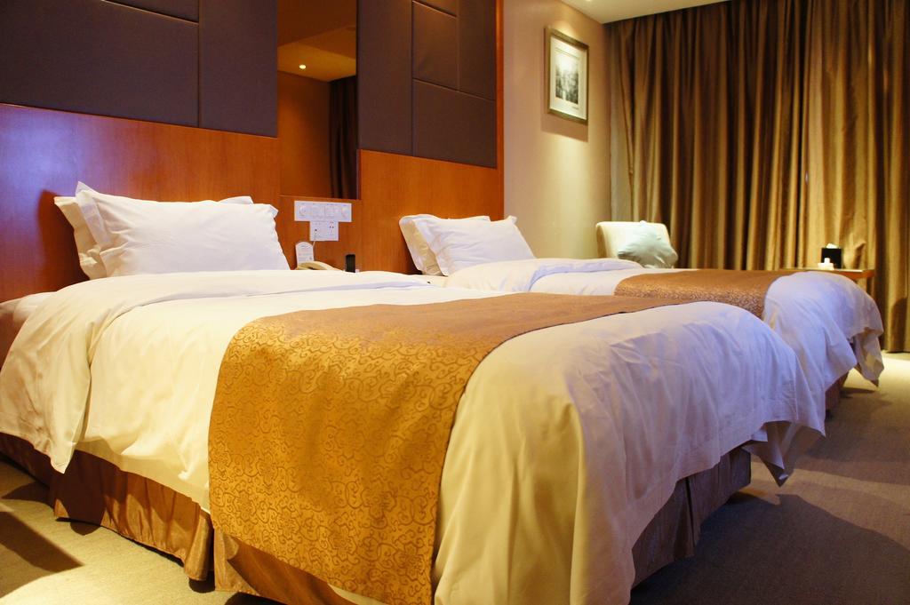 Oriental Hotel Tong Xiang Jiaxing Rom bilde